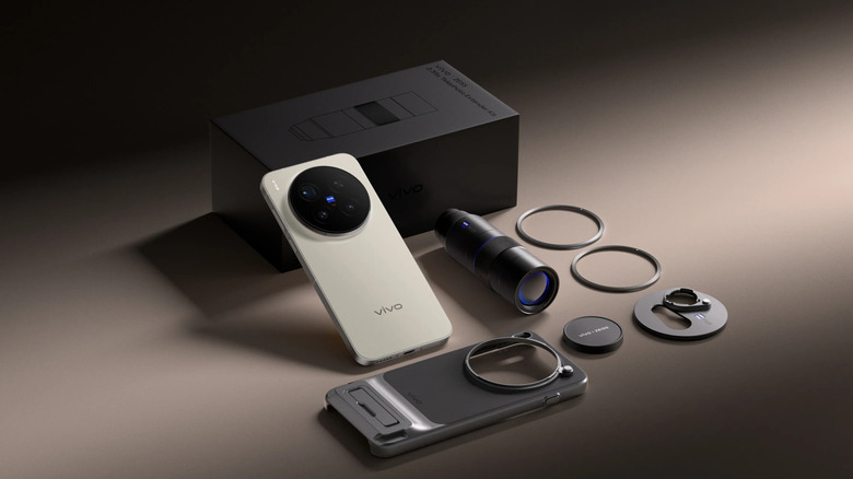 Vivo X300 Pro propped against its box along with its teleconverter kit