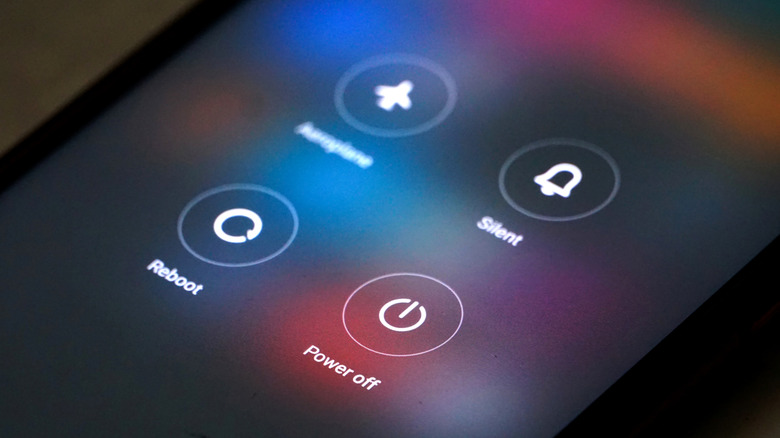 A phone's power menu displaying the Reboot, Power Off, Silent, and Airplane mode options