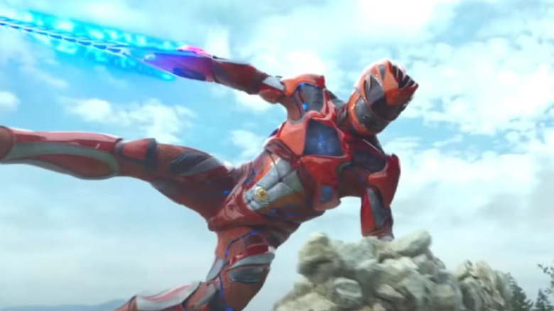Jason the Red Ranger (Dacre Montgomery) flying through the air in "Power Rangers."