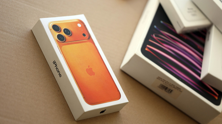 Retail boxes for iPhone 17 Pro, iPad Pro, and other Apple products.