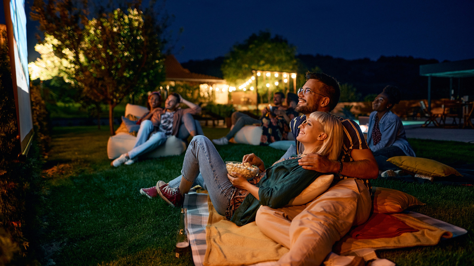 Projectors Vs. Outdoor TVs: Which Is Best For Watching Movies Outside?