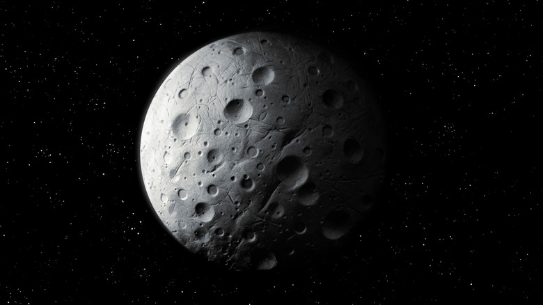 A dwarf planet in space isolated. Stone planet on a black background. Surface of a satellite with meteor craters.