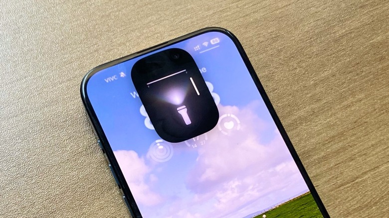 iPhone flashlight beam on iOS 18