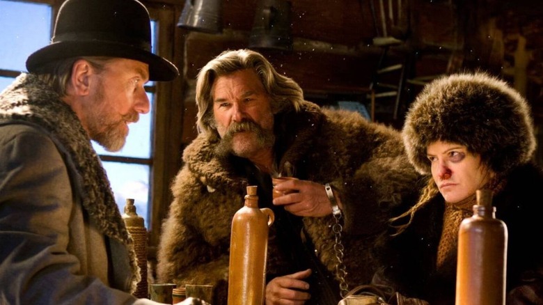 Jennifer Jason Leigh, Tim Roth, and Kurt Russell in The Hateful Eight