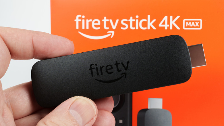 amazon fire tv stick max held in hand