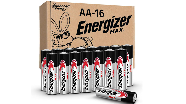 Energizer batteries lined up in front of their cardboard packaging with one laying down