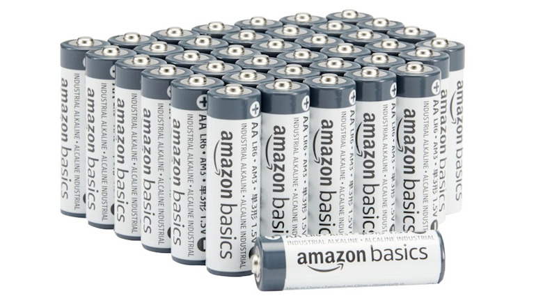 Amazon Basics batteries lined up with one laying flat on its side