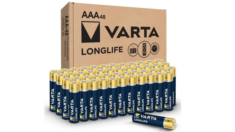 Varta AAA batteries lined up outside of their cardboard box