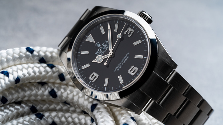 A black Rolex Oyster Perpetual I luxury watch