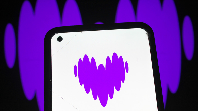 The Deezer logo displayed on a smartphone