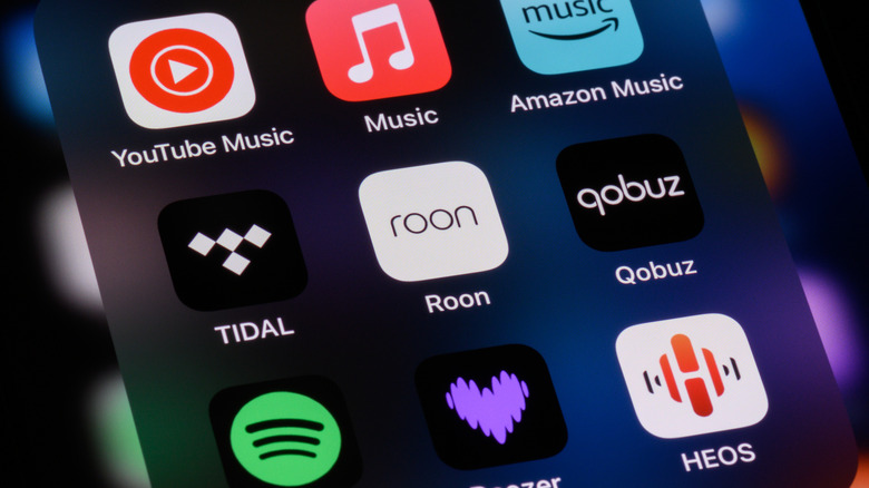 Smartphone showing different music streaming apps