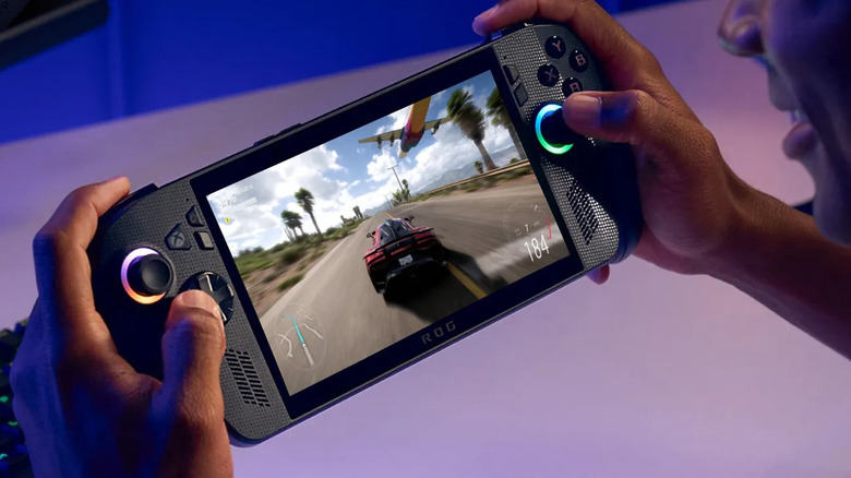 ROG Xbox Ally X held by someone while they play Forza Horizon 5 being played