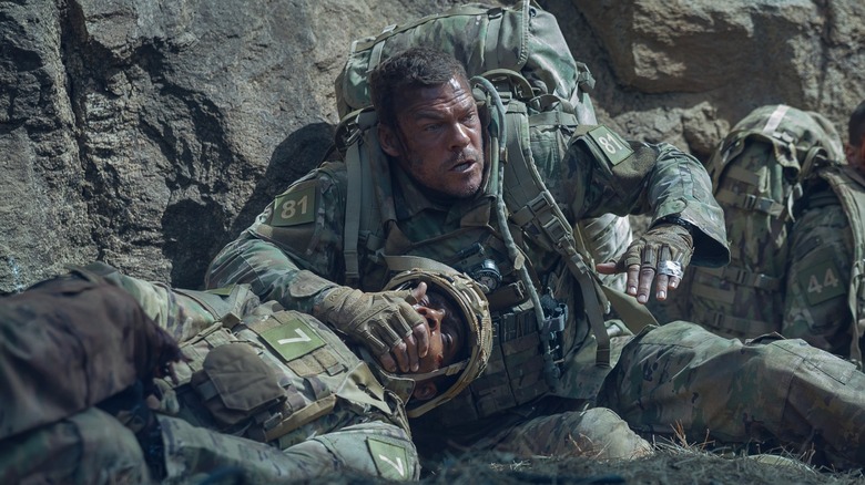 Stephan James as 7, Alan Ritchson as 81 in War Machine