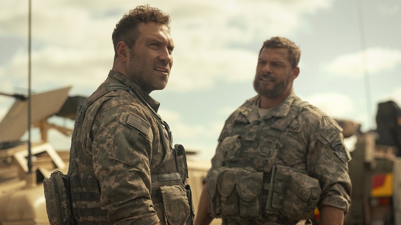 Jai Courtney as Squad Leader and Alan Ritchson as 81 in War Machine