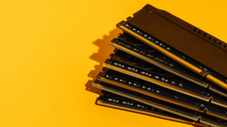 A picture of RAM chips against a yellow background