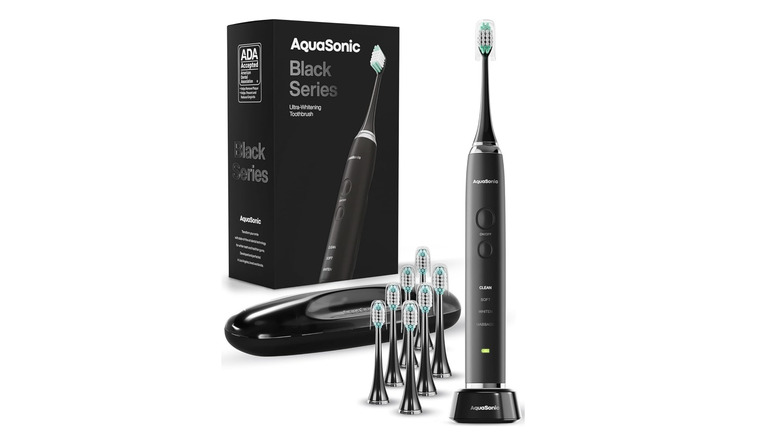 Aquasonic electric toothbrush with replacement heads