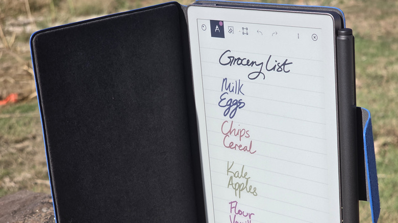 remarkable paper pro move open with folio case, showing grocery list