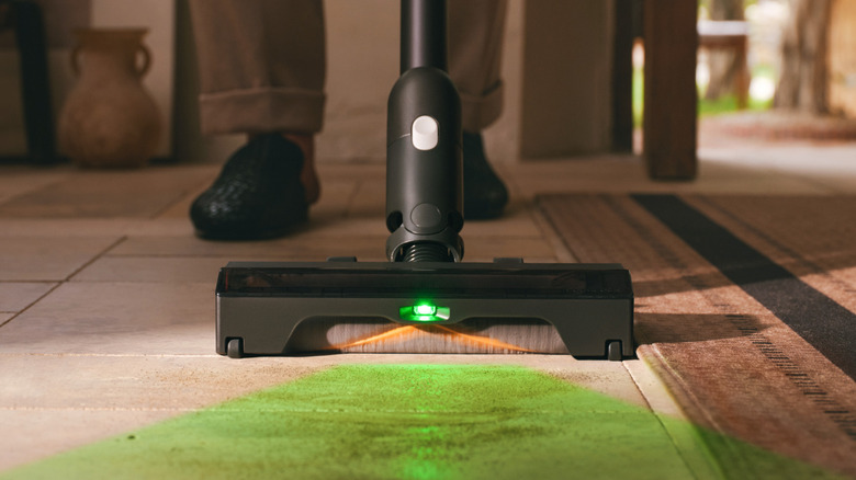 Roborock's H60 Ultra emits a green light to help you clean the house