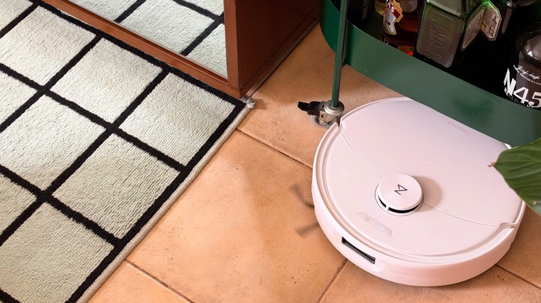 A robot vacuum cleaning a living room