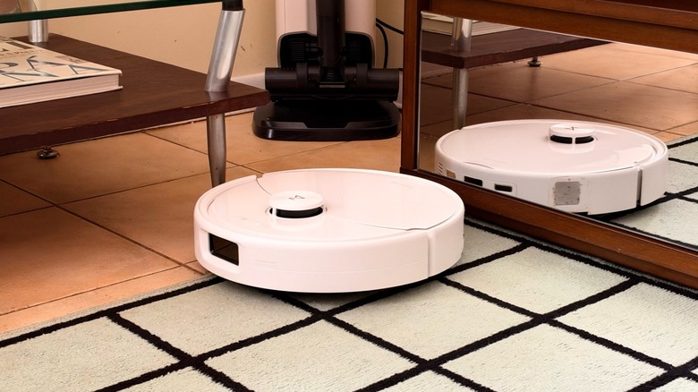 Roborock's robot vacuum cleaning a living room