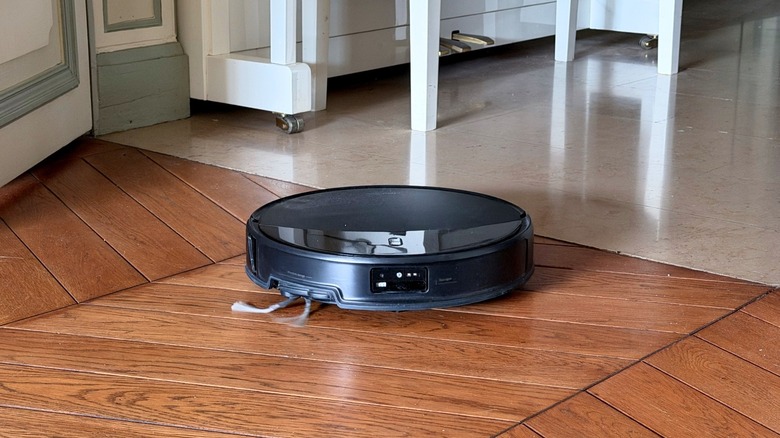 A robot vacuum cleaning the floor
