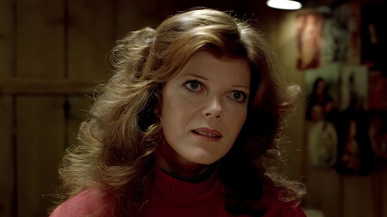 Nola (Samantha Eggar) wearing a sweater in 
