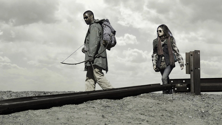 Eli and Solara walking in the wasteland