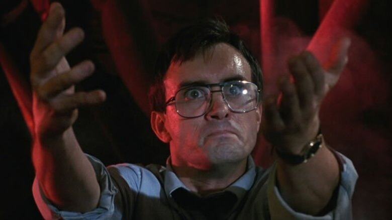 Herbert West (Jeffrey Combs) extending his hands in "Bride of Re-Animator."