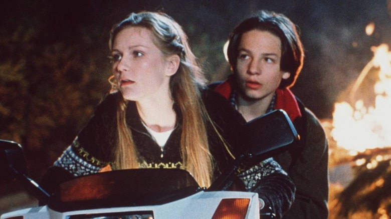 Kirsten Dunst and Gregory Smith in Small Soldiers