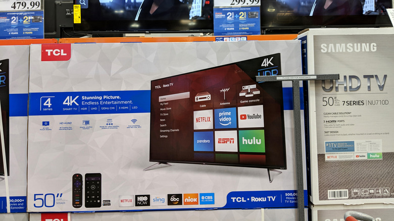 A TCL TV powered by Roku OS on display