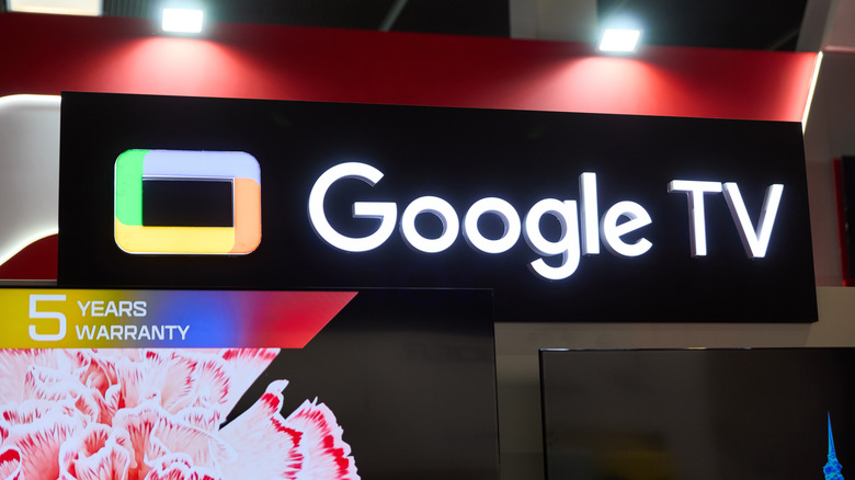 A photograph of the Google TV logo as seen at a trade show.