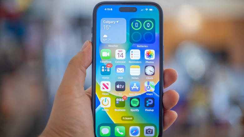 iPhone 15 Plus in hand