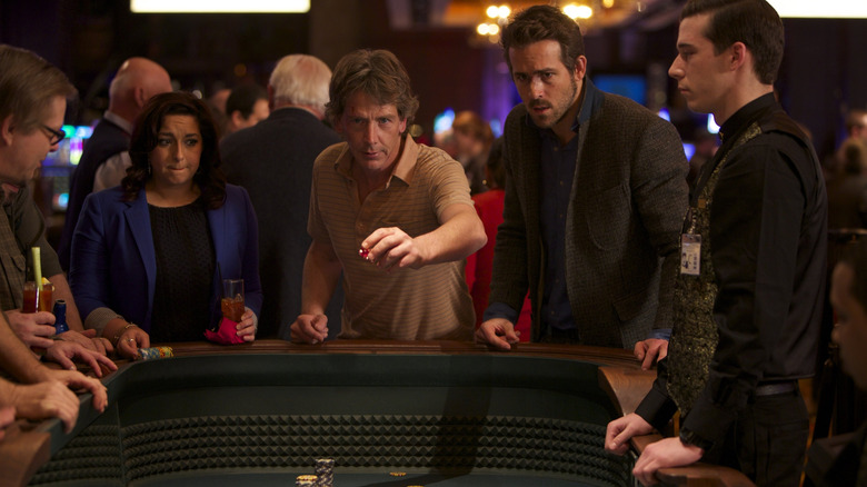 Ben Mendelsohn and Ryan Reynolds in Mississippi Grind (2015).