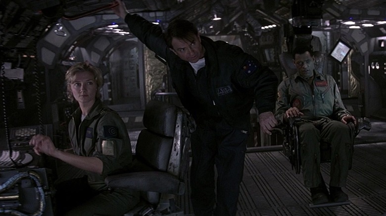 Sam Nieil and Laurence Fishburne in 
