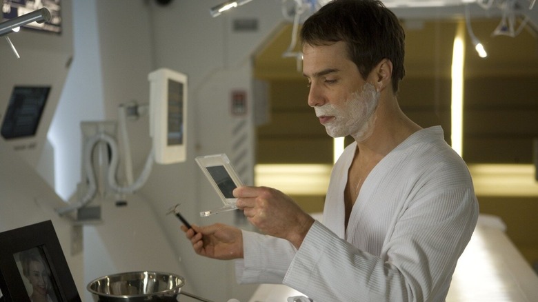 Sam shaving in his space station