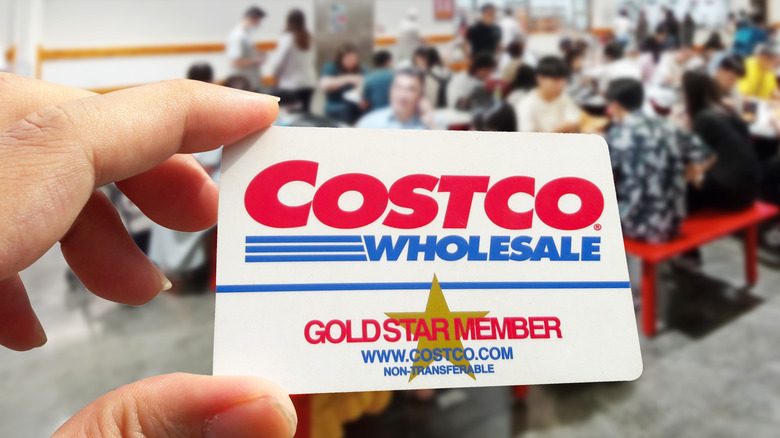 A close-up photo of a Costco Gold Star Membership card while in a cafeteria.