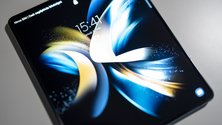 samsung folding phone with time showing on it