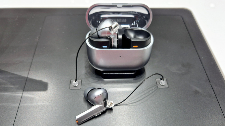 The Samsung Galaxy Buds 3 Pro, with one bud out of the case