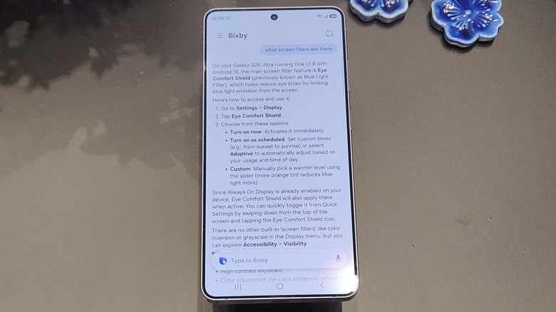 The Samsung Galaxy S26 Ultra showing a search with Bixby that prompts the user to the Settings menu