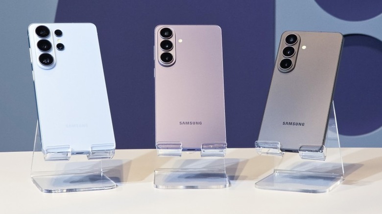 Samsung Galaxy S26 Series phones on a stand and publicly displayed.