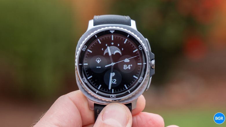 Holding the Samsung Galaxy Watch 8 Classic