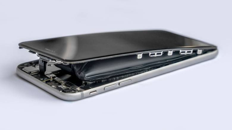 smartphone with swelled battery, display front popping off
