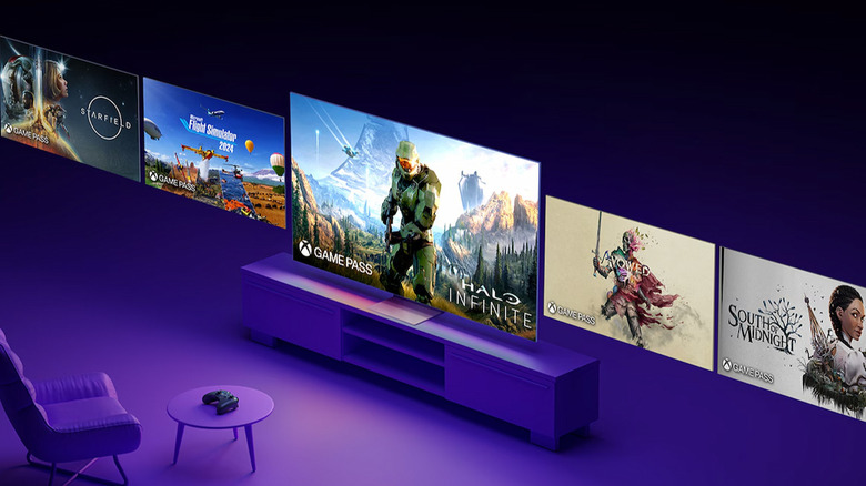 A purple living room with a large TFV, showing different Xbox games to play