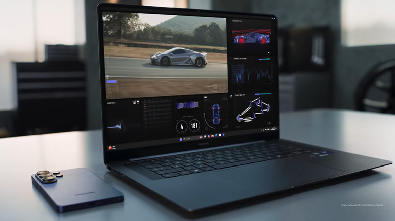 A Samsung Galaxy Book 6 Pro shows futuristic racing software and a silver race car, while a blue Samsung Galaxy smartphone sits face down on the table.