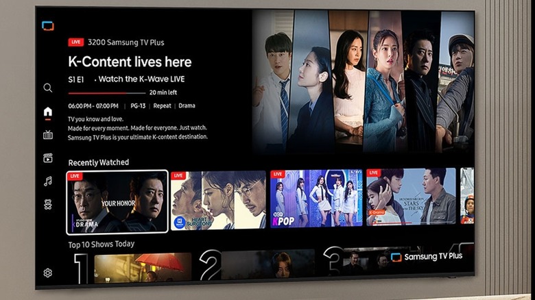 77 Inch Class OLED S95H 4K mounted on a wall displaying shows available through Samsung TV Plus