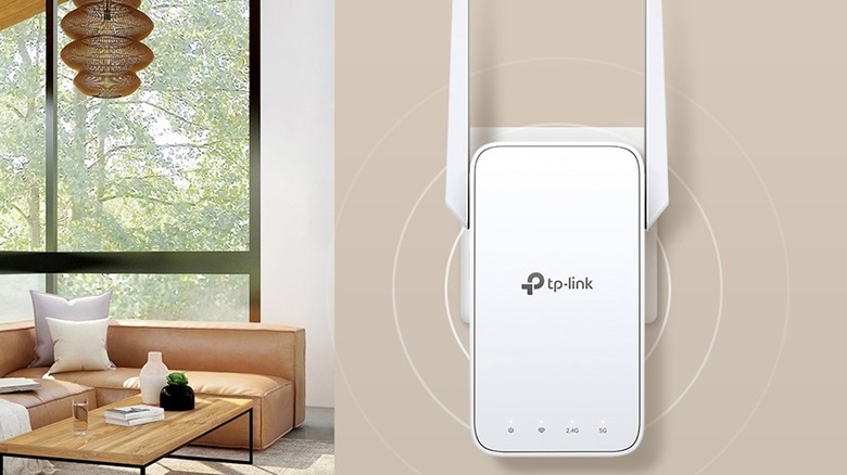 TP-Link RE315 AC1200 Wi-Fi Extender attached to a wall