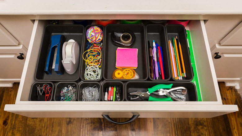 an organized drawer with dividers