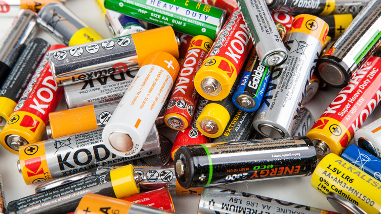 a bunch of batteries in a pile