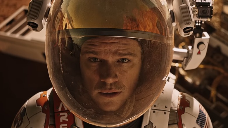 Matt Damon as Mark Watney looking up in The Martian