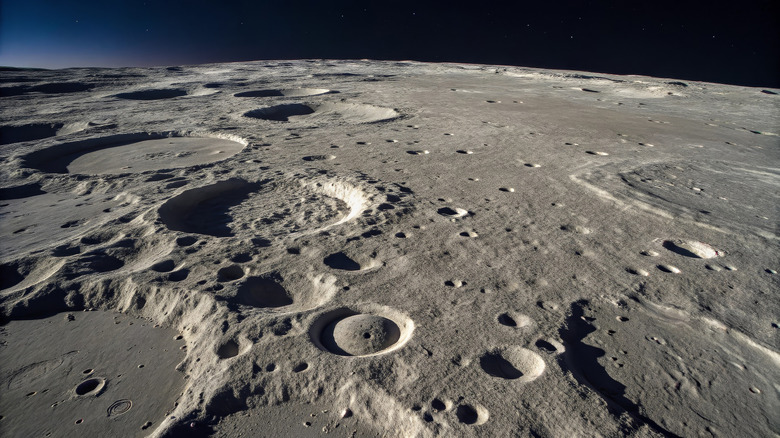 Moon's surface image taken by a high-powered camera shows meteor impacts and shadowed craters